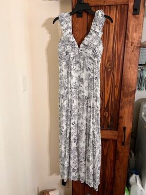 White Maxi Dress with Blue Floral Print and Ruffle V-Neck